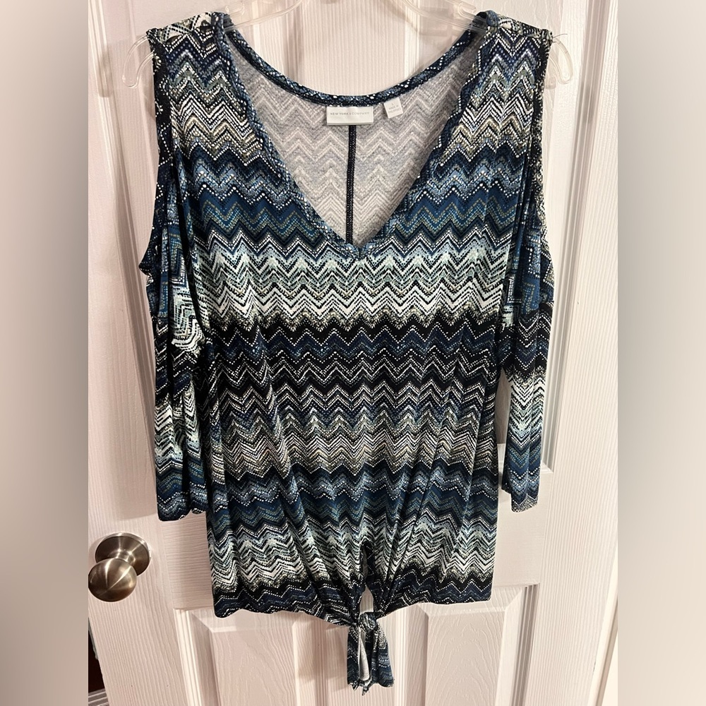 New York and Co cold shoulder top in a variety of blues.